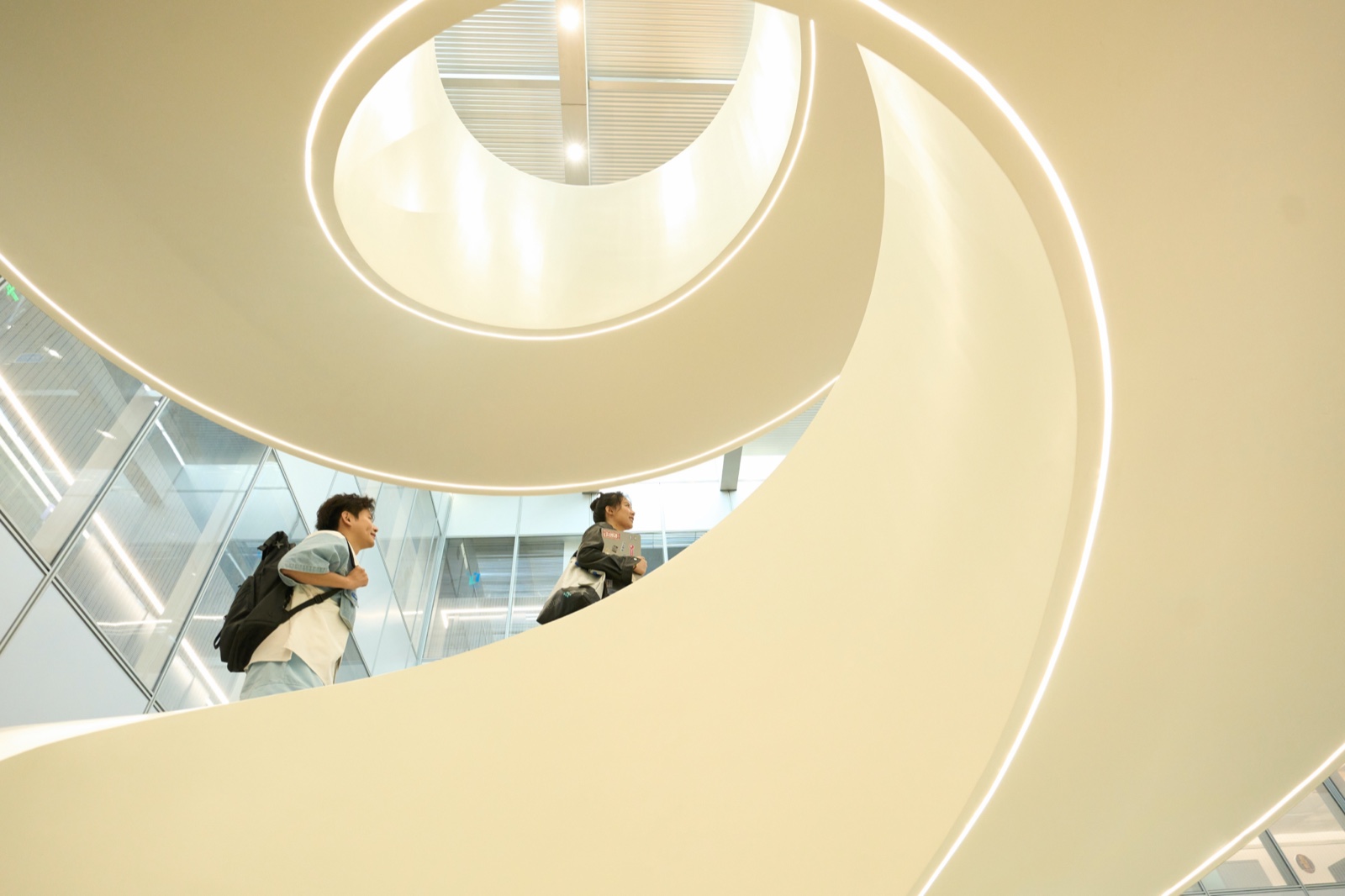 ByteDance colleagues walking through a spiral office interior